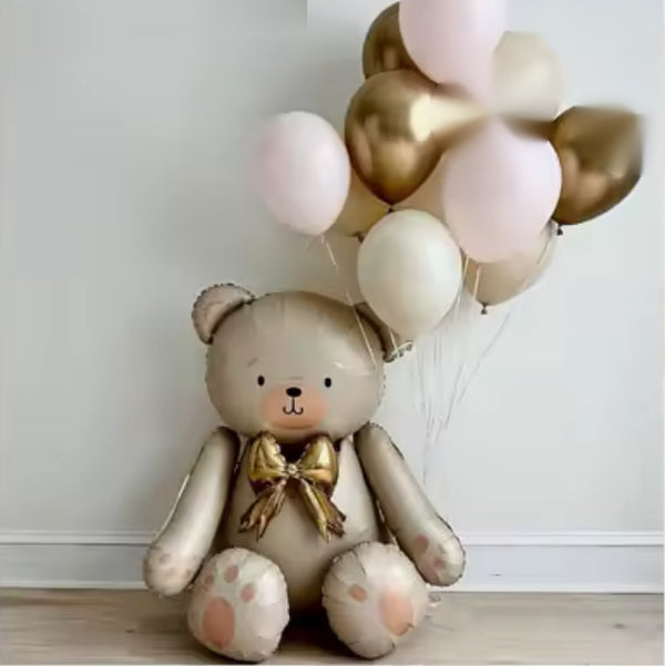 Teddy bear balloon with pink, cream and gold balloons in a Miami nursery, Mia Mur balloon delivery